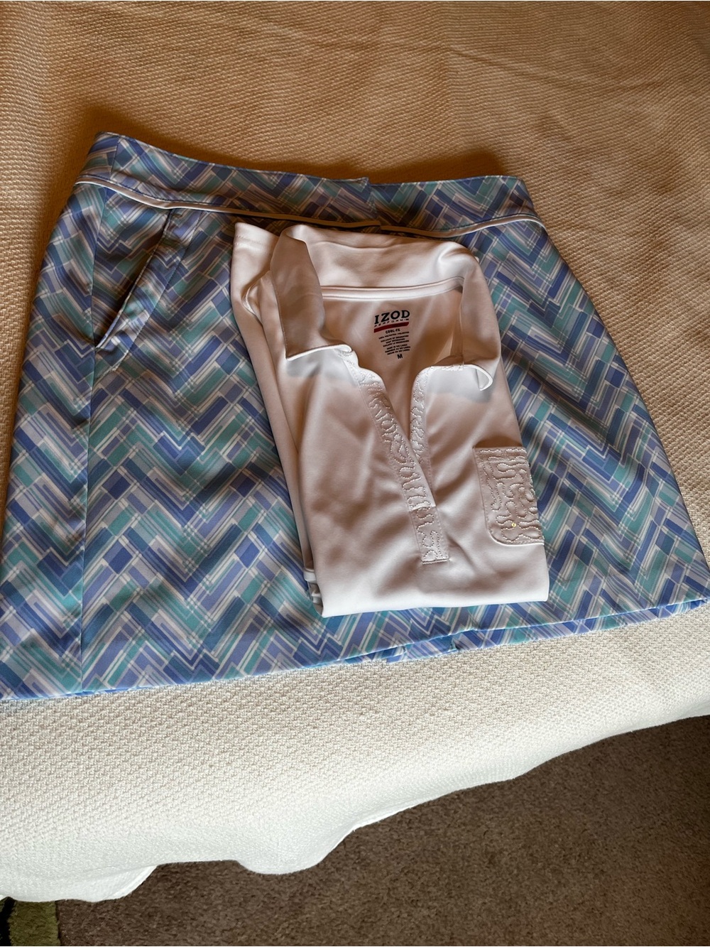 Izod Golf Set - White Sleeveless Golf Shirt and Blue and White Skort